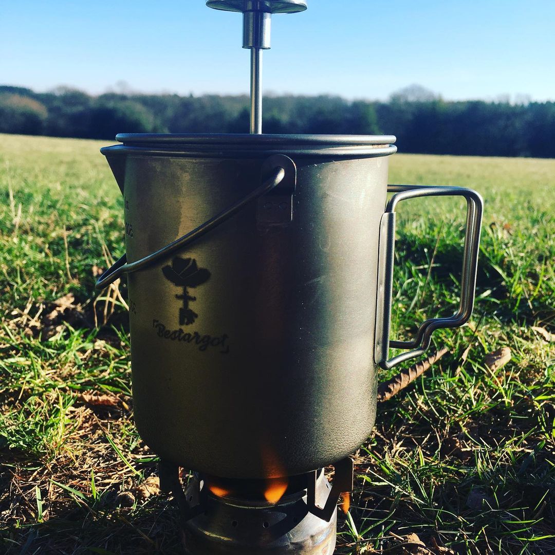 Bestargot Titanium French Press was placed on the alcohol stove to boil.